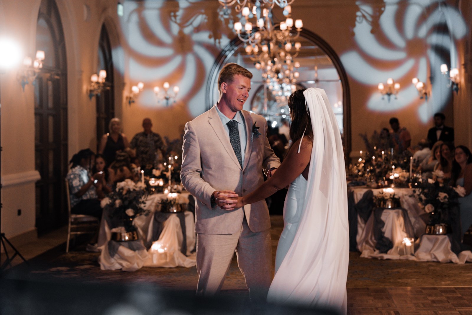 First dance in the hotel's arched hallway